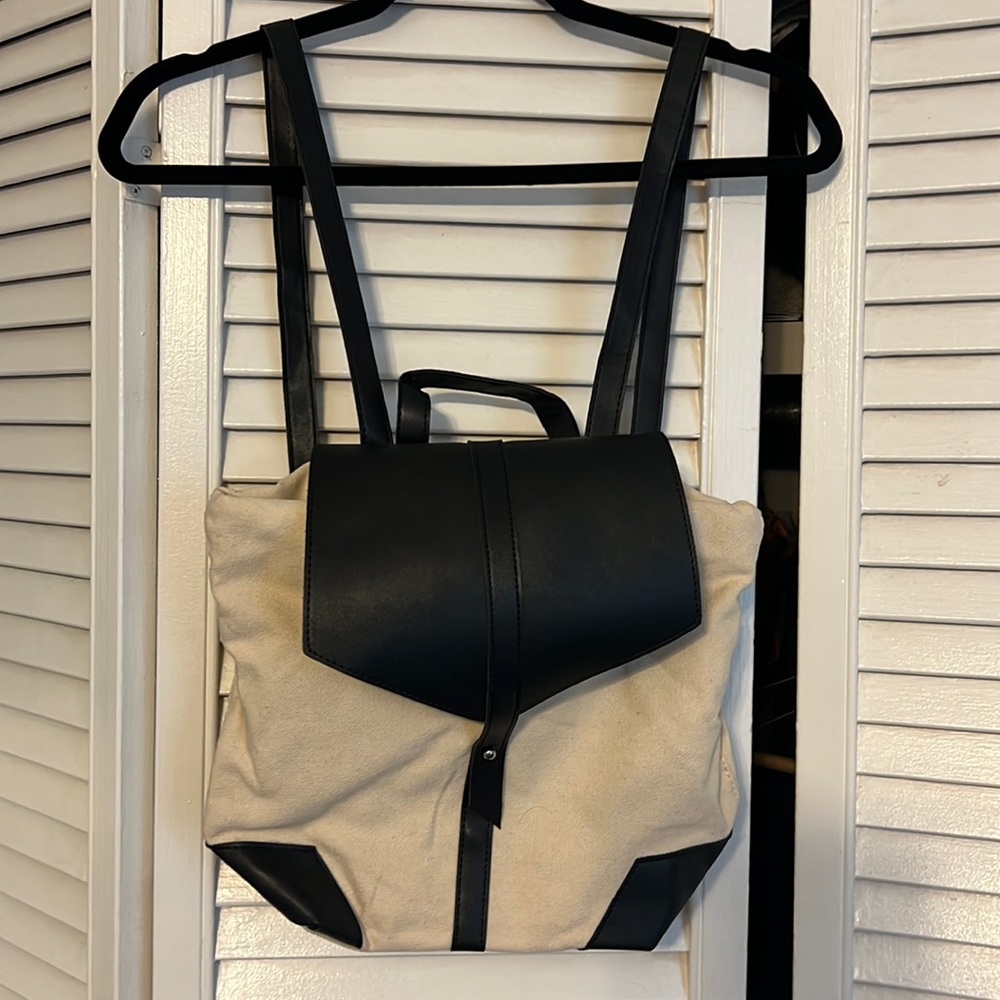 Vegan  canvas DEUX LUX adjustable back pack purse Never used with dust bag